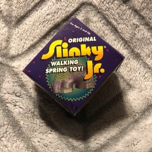 Original Slinky Jr “Walking Spring Toy.”   New in box. Box open without damage.